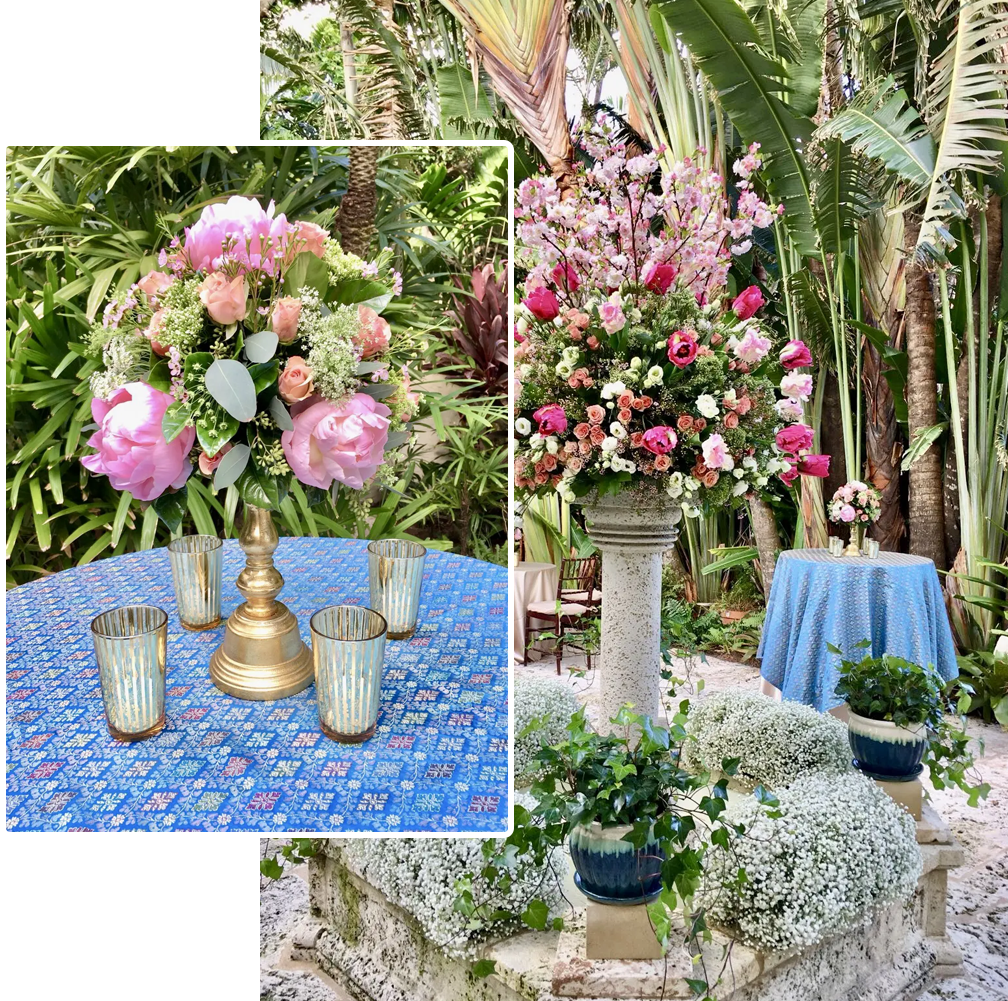 A table with flowers and candles in it